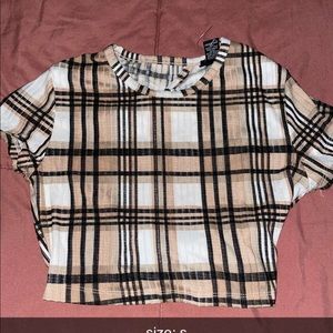 colors are tan, black & white, never worn size : small